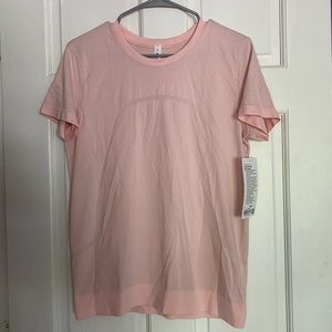 Pink lululemon swiftly shirt